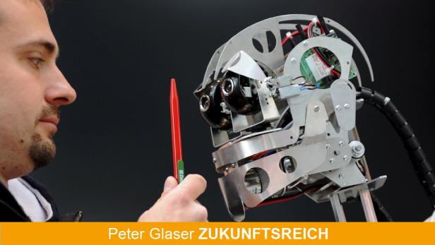 ARCHIV - Ein Techniker richtet am 19.04.2009 in Hannover auf der Hannover Messe die Kamera-Augen eines humanoiden Roboters. Hilfreiche Maschinen sollen sich in Zukunft in jedem Haushalt nützlich machen. «Dem Menschen dienen im täglichen Leben und in de