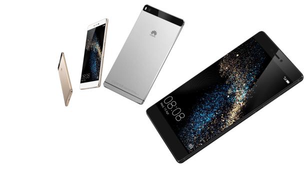 Drei Huawei Smartphones in Gold, Silber und Schwarz liegen auf einem weißen Hintergrund.