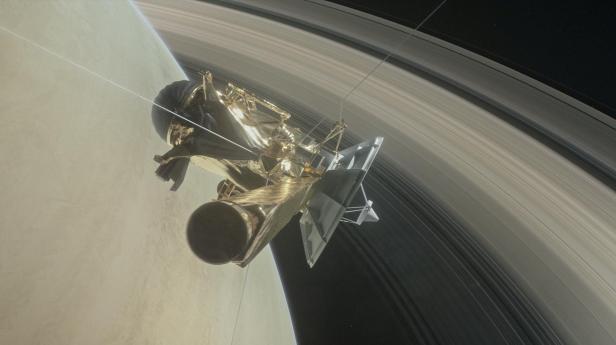 Konzeptdarstellung der Raumsonde Cassini vor den Saturn-Ringen