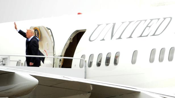 U.S. President Donald Trump boards Air Force One a