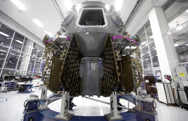 The SpaceX space craft Crew Dragon is shown being built inside a cleanroom at SpaceX headquarters in Hawthorne, California