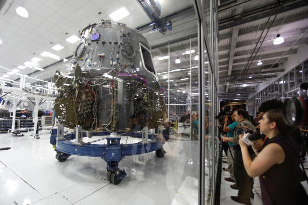 The SpaceX space craft Crew Dragon is shown being built inside a cleanroom at SpaceX headquarters in Hawthorne, California