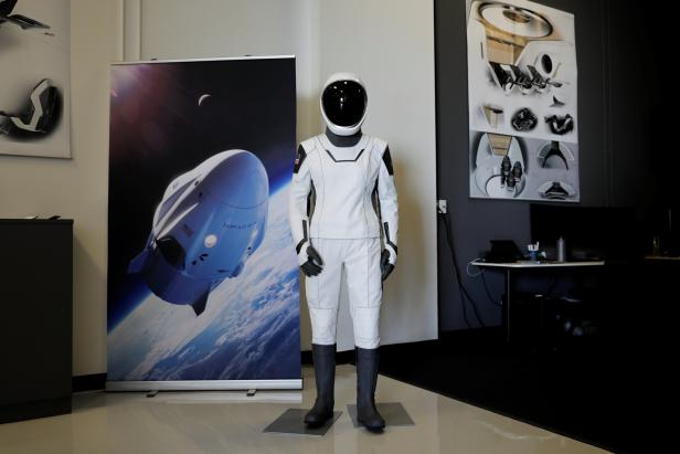 SpaceX shows new spacesuit to be worn by NASA astronauts who will the companies Crew Dragon spacecraft