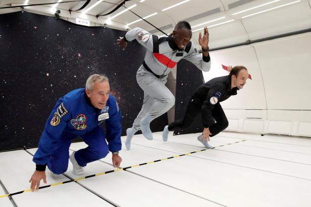 Retired sprinter Usain Bolt, French astronaut Jean-Francois Clervoy and French Interior designer Octave de Gaulle enjoy zero gravity conditions during a flight in a specially modified plane above Reims