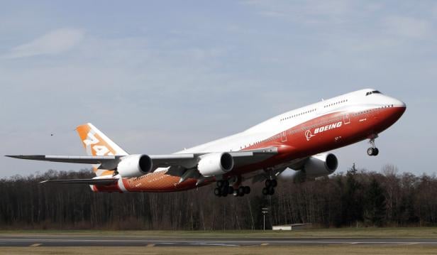 The Boeing 747-8 Intercontinental takes off on its maiden flight from Paine Field, in Everett, Washington