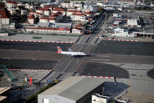 A British Airways aircraft taxis after landing at Gibraltar International Airport near the border with Spain in the British overseas territory of Gibraltar, historically claimed by Spain