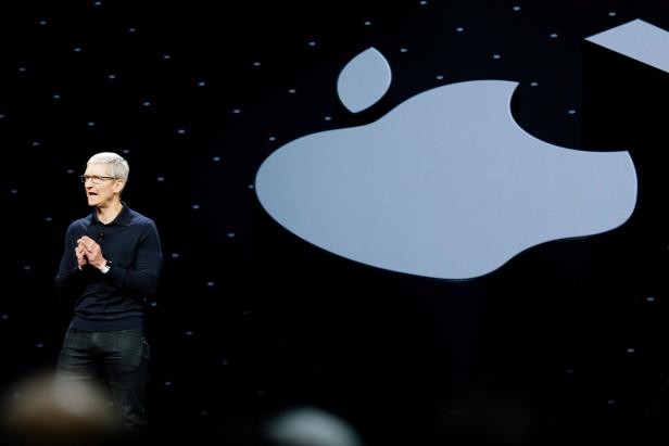 FILE PHOTO: Apple Chief Executive Officer Tim Cook speaks at the Apple Worldwide Developer conference (WWDC) in San Jose