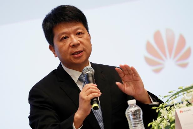 Huawei's rotating Chairman Guo Ping speaks during an news conference in Shenzhen, Guangdong province