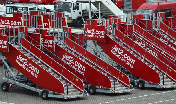 FILE PHOTO: Jet2.com aircraft boarding steps at Stansted airport in Britain