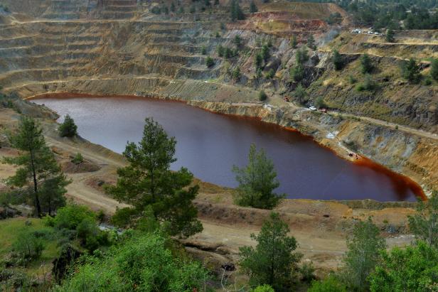 View of Kokkinopezoula lake, also known as "red lake" where forensics officers search for possible bodies of victims of a suspected serial killer, near the village of Mitsero