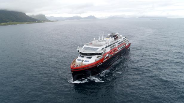 Hurtigruten's cruise ship MS Roald Amundsen is seen in the sea near Ulsteinvik