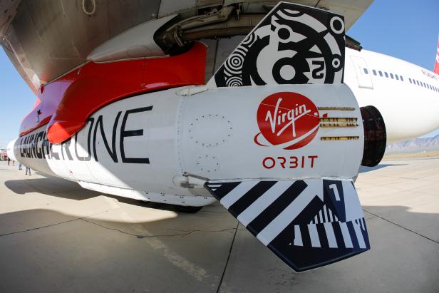 Richard Branson's Virgin Orbit, with a rocket underneath the wing of a modified Boeing 747 jetliner, prior to its takeoff on a key drop test of its high-altitude launch system for satellites from Mojave, California