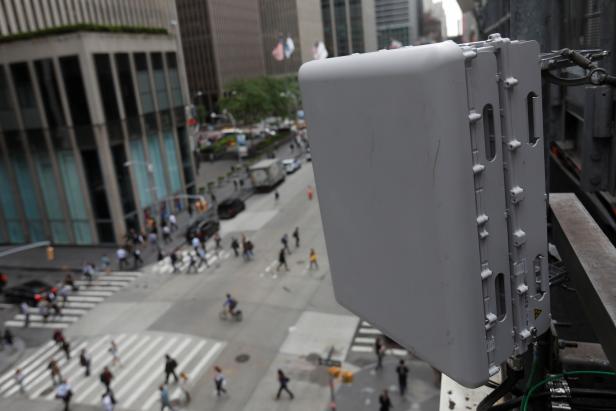 A Sprint Massive MIMO, a multiple input and output radio antenna combo for 4G and 5G, manufactured by Nokia is seen on top of a building in New York City