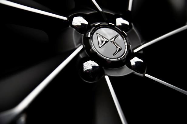 A logo is seen on a model of an alloy rim used for the conception of the new DS 3 Crossback SUV presented at PSA's DS Brand Automotive Design Network centre in Velizy