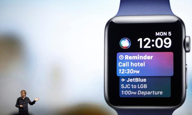 FILE PHOTO: Kevin Lynch speaks near a projection of an Apple Watch during the company's annual world wide developer conference in San Jose