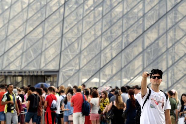 FRANCE-TOURISM-MUSEUM-LOUVRE-FEATURE