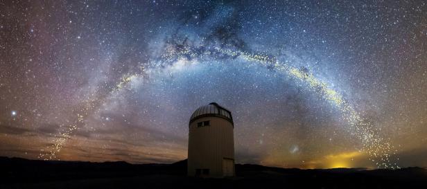 The warped shape of the stellar disk of the Milky Way galaxy is seen over the Warsaw telescope