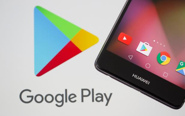 A Huawei smartphone is seen in front of displayed Google Play logo in this illustration picture