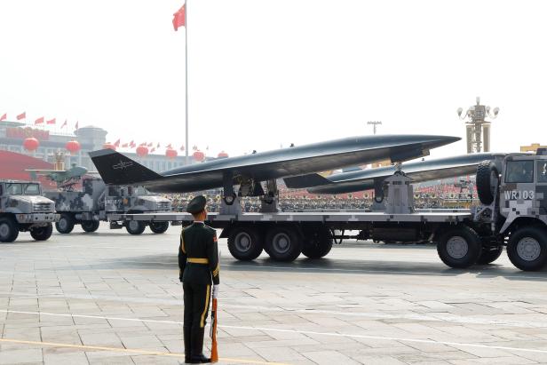 Military vehicle carrying a WZ-8 supersonic reconnaissance drone travels past Tiananmen Square during the military parade marking the 70th founding anniversary of People's Republic of China
