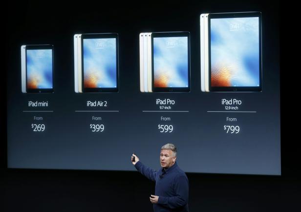 Phil Schiller, senior VP of worldwide marketing for Apple, introduces the iPad line during an event at the Apple headquarters in Cupertino, California 