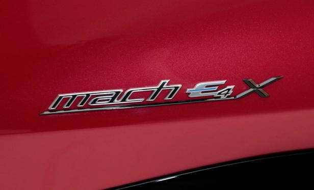 The name-plate is seen on Ford Motor Co's all-new electric Mustang Mach-E vehicle during a photo shoot at a studio in Warren, Michigan