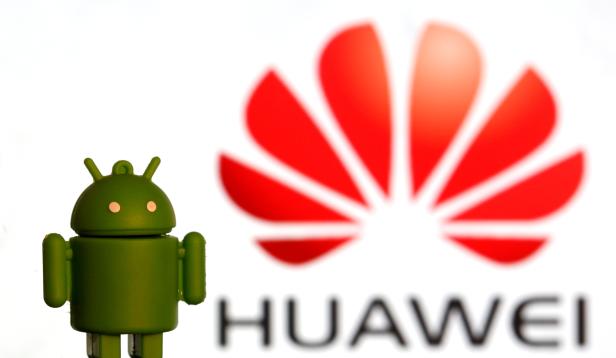 3-D printed Android logo is seen in front of a displayed Huawei logo in this illustration picture