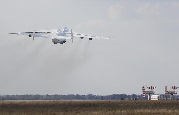 An Antonov An-225 Mriya cargo plane takes off during its first commercial flight after renovation at an airfield in the settlement of Hostomel outside Kiev