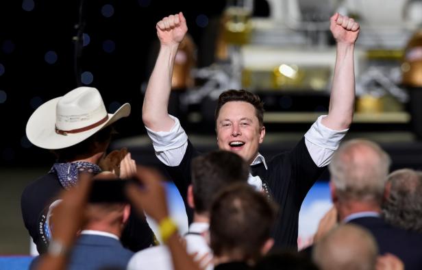 SpaceX CEO Elon Musk celebrates after the launch of a SpaceX Falcon 9 rocket and Crew Dragon spacecraft on NASA's SpaceX Demo-2 mission to the International Space Station from NASA's Kennedy Space Center in Cape Canaveral