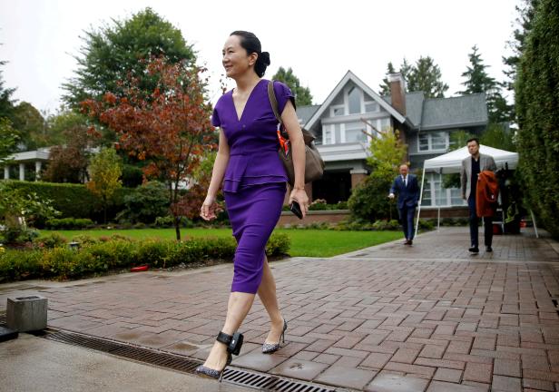 FILE PHOTO: FILE PHOTO: Huawei Technologies Chief Financial Officer Meng Wanzhou leaves her home