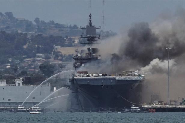 Smoke rises from a fire on board the U.S. Navy amphibious assault ship USS Bonhomme Richard