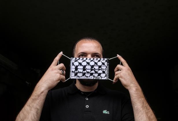 Palestinian tailor makes face masks from keffiyeh cloth in Gaza to send to Europe