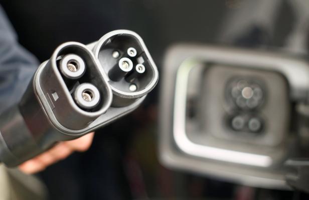 FILE PHOTO: German telecommunications company Telekom AG presents it's first multi-charging system for elcetric cars in Bonn