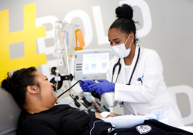 FILE PHOTO: Cruz, an ER technician at Valley Medical Center in Renton, donates convalescent plasma at Bloodworks Northwest for an experimental treatment study during the coronavirus disease (COVID-19) outbreak in Seattle