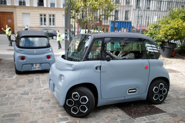 PSA's Citroen test drives new electric city car AMI in Paris