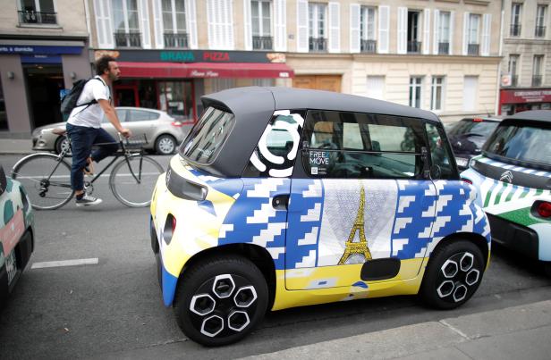 PSA's Citroen test drives new electric city car AMI in Paris