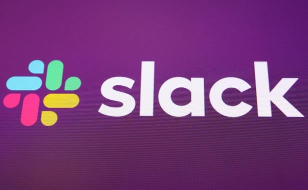 Slack Technologies Inc. logo is seen at the New York Stock Exchange (NYSE) during the company's direct listing in New York