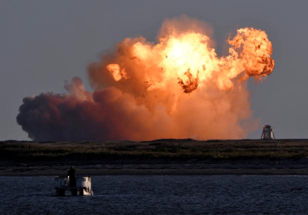 SpaceX's first super heavy-lift Starship SN8 rocket explodes during a return-landing attempt after it launched from their facility on a test flight in Boca Chica, Texas