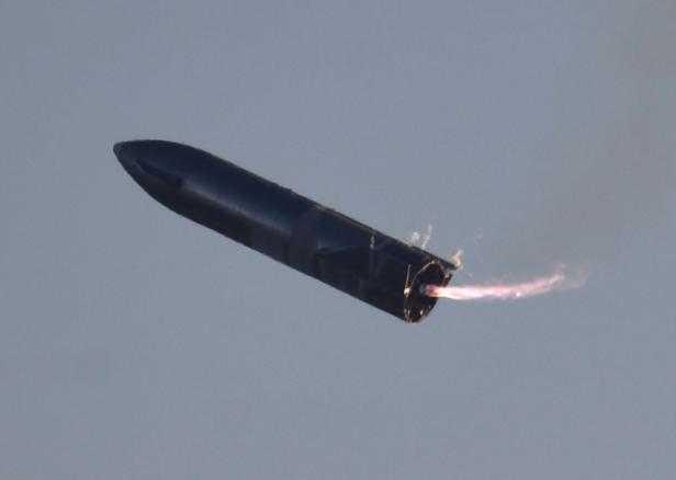 Test flight of SpaceX's first super heavy-lift Starship SN8 rocket after it launched from their facility in Boca Chica,Texas