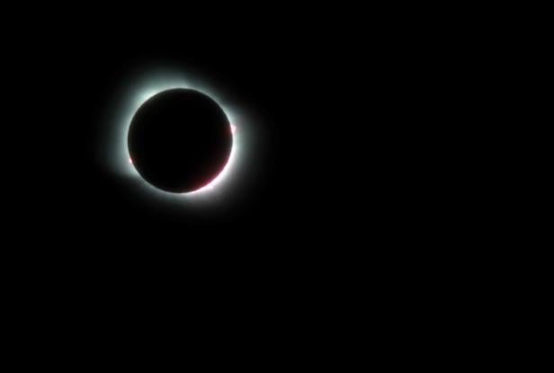 A total solar eclipse, visible in parts of Chile and Argentina, is seen in Las Grutas, in the Rio Negro province