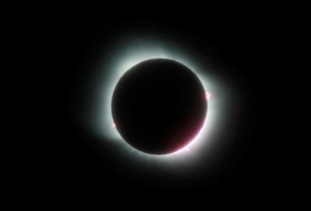 A total solar eclipse, visible in parts of Chile and Argentina, is seen in Las Grutas, in the Rio Negro province