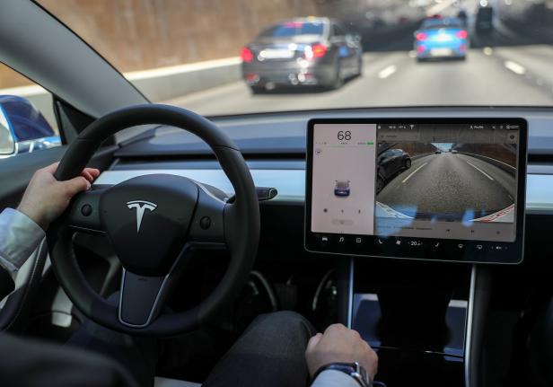 FILE PHOTO: The interior of a Tesla Model 3 electric vehicle is shown in Moscow