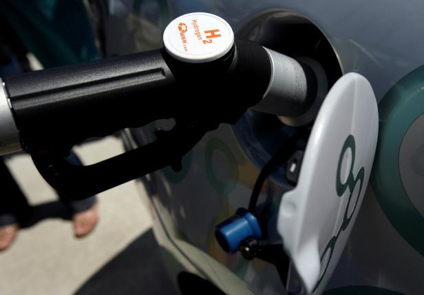 FILE PHOTO: A GM Hydrogen Fuel Cell vehicle is seen being fueled at the Shell Hydrogen fueling station during its opening at JFK Airport in New York