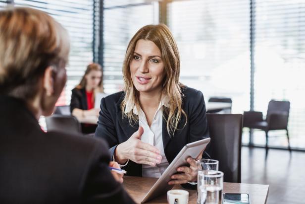 Business People at the Cafe Restaurant