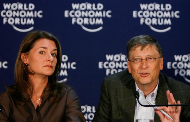 FILE PHOTO: Microsoft founder Gates and his wife Melinda attend a news conference at the World Economic Forum in Davos