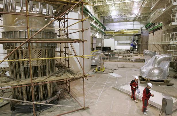 FILE PHOTO: Technicians working on the third unit of the Mochovce Nuclear Power Plant