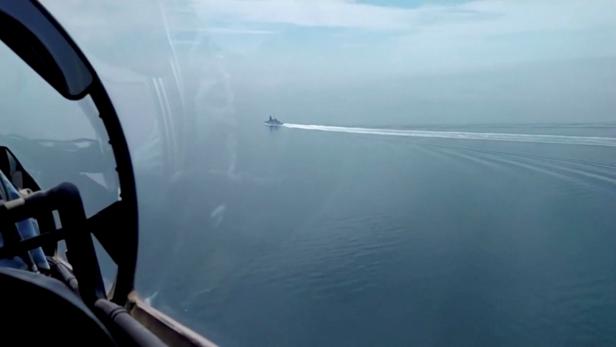 A still image taken from a video released by Russia's Defence Ministry allegedly shows British Royal Navy's Type 45 destroyer HMS Defender in the Black Sea