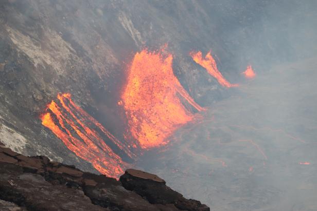 Fissures that opened on the western wall of Halema'uma'u crater are seen during the eruption of Kilauea  volcano