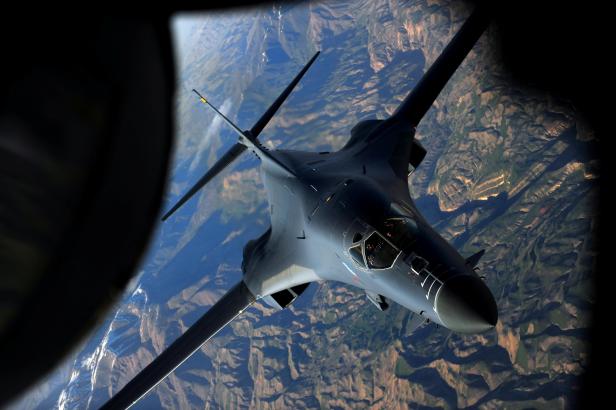 A B-1B Lancer returns to mission after receiving fuel from a KC-135 Stratotanker while flying over Afghanistan