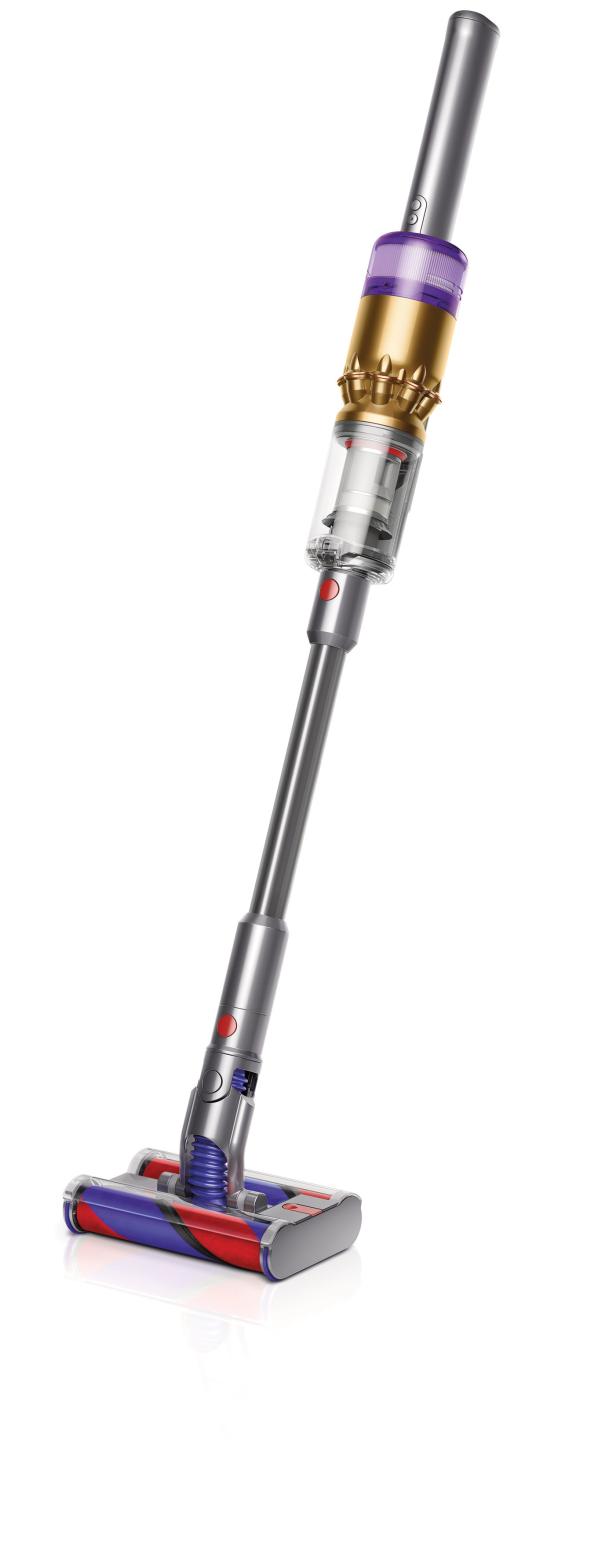 Ein kabelloser Staubsauger von Dyson in Gold, Lila, Rot und Silber.