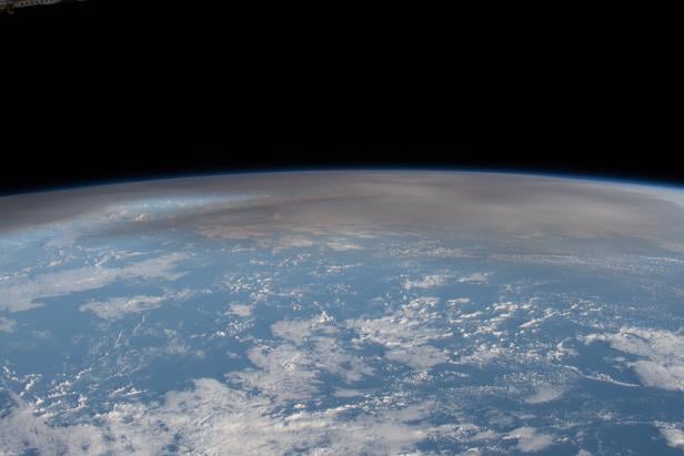 Atmospheric plume from Tonga's underwater volcano eruption seen from the International Space Station